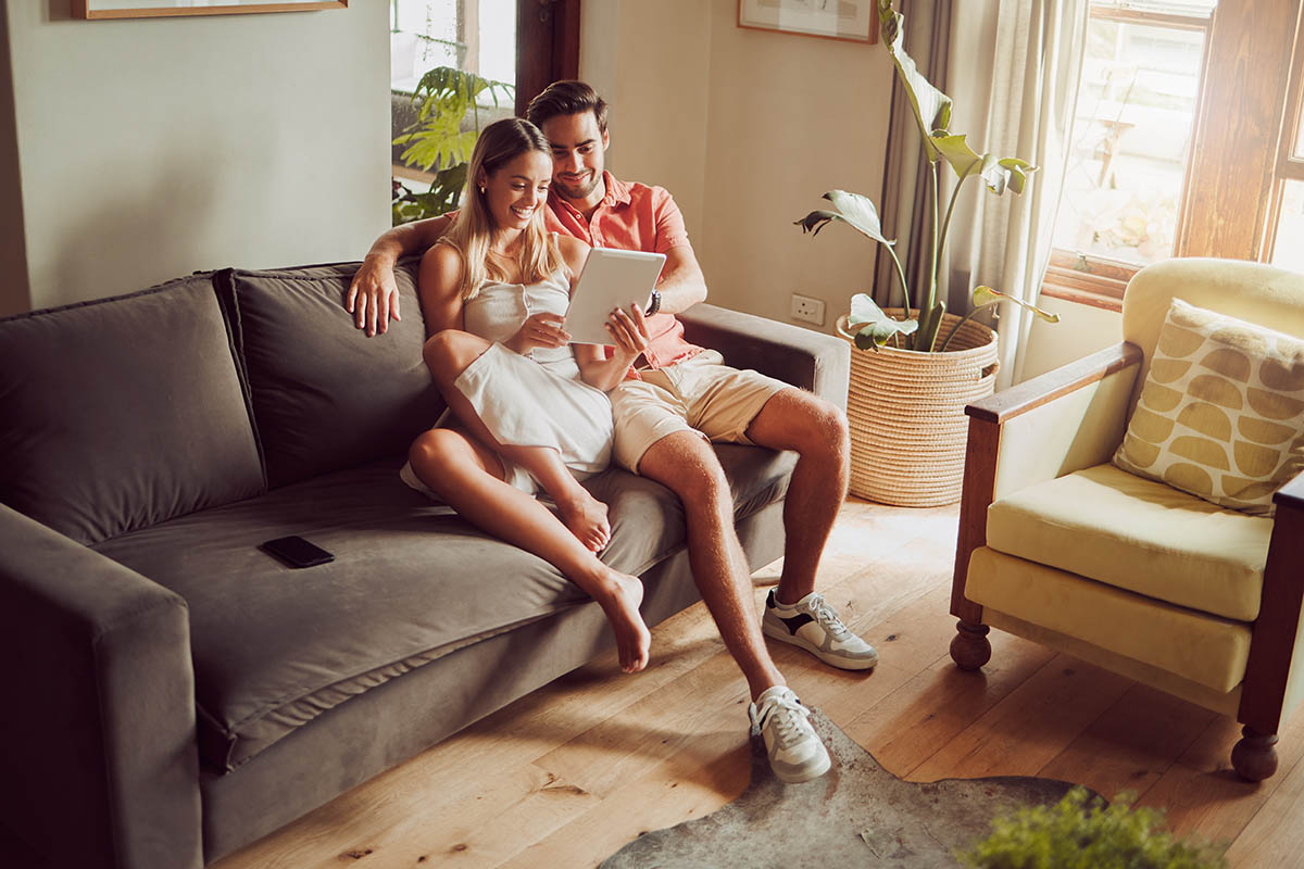 couple looking at a tablet